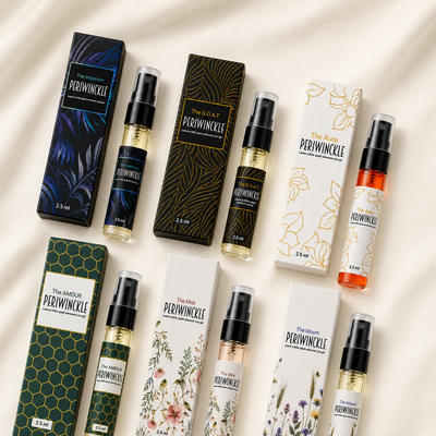 Flat lay of all six 2.5ml vials in The Full House perfume discovery set