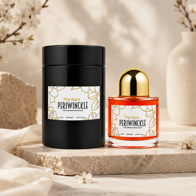The Aura 50ml parfum bottle and packaging in a styled product display